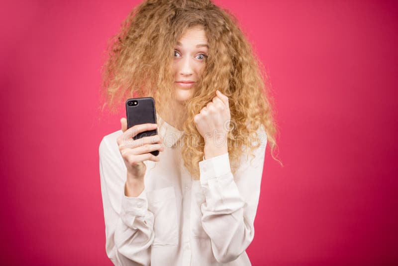 Crazy woman with funky hair is making pictures stock images Crazy woman with funky hair is making pictures stock images