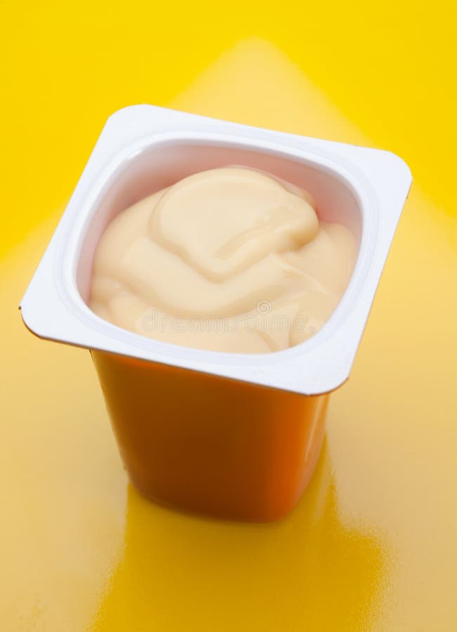 Cream caramel yoghurt stock photo. Image of open, yellow 16421026