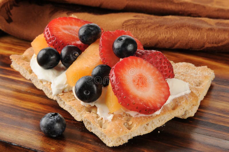 Cream cheese and berries on sesame flatbread royalty free stock photos Cream cheese and berries on sesame flatbread royalty free stock photos