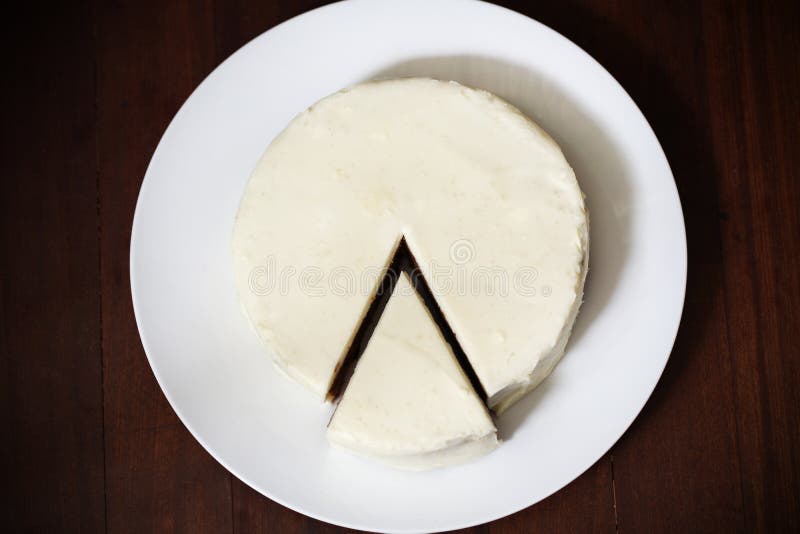 Cream cheese pie or cake with cut piece, dessert royalty free stock images Cream cheese pie or cake with cut piece, dessert royalty free stock images