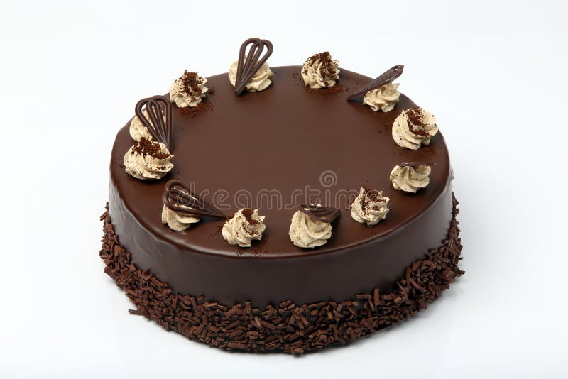 Cream chocolate cake with icing on white background