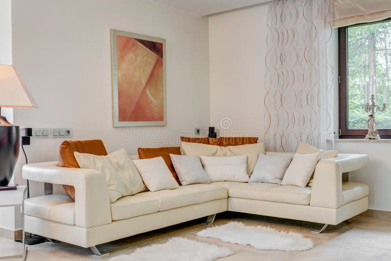Cream corner sofa stock image. Image of decorative, comfortable 56343375