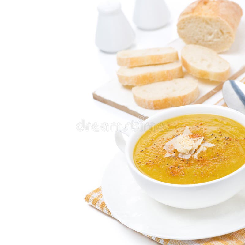 Cream soup of yellow lentils with vegetables, isolated