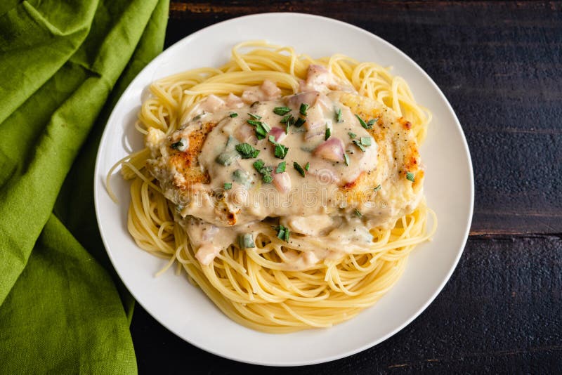 Chicken Cutlets Served Over Angel Hair Pasta with a Creamy Mustard