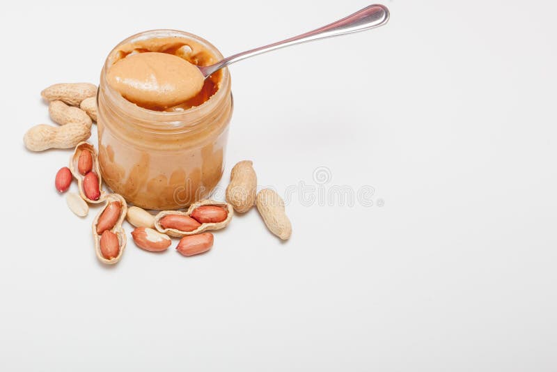Premium Photo  Spoon with peanut butter isolated on white background