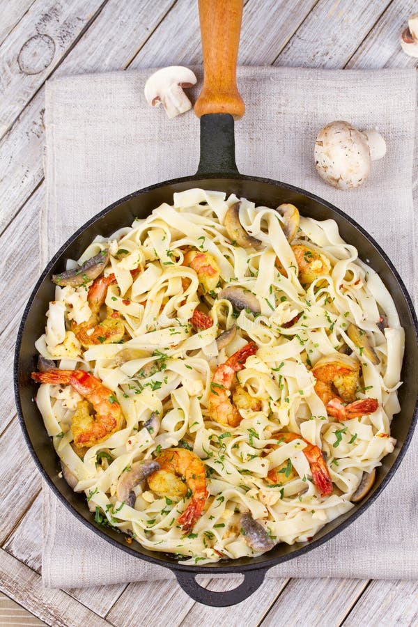 Creamy Shrimp and Mushroom Pasta. Stock Photo Image of meat, closeup