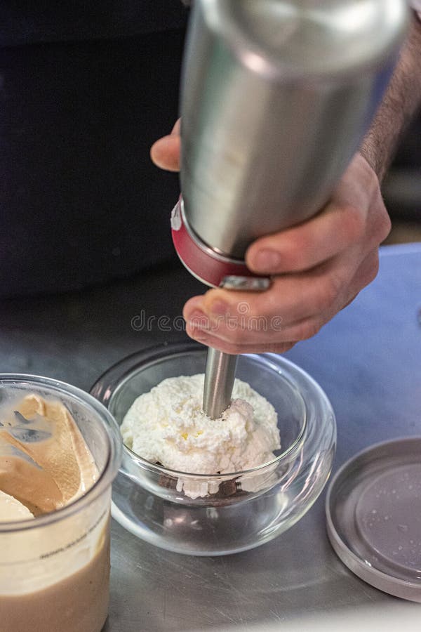 Creamy texture creation with immersion blender for culinary innovation and delicious recipes concept stock image