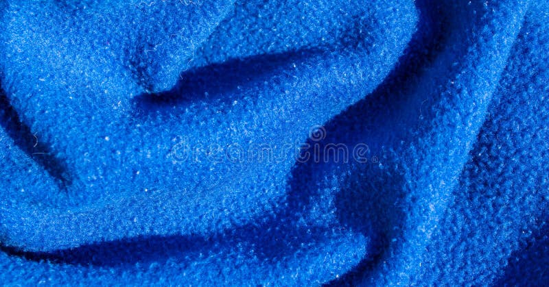 Creased blue cotton fabric. background stock photos