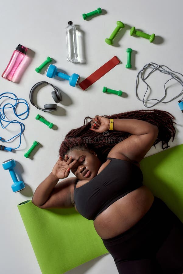 Create Change. Top View of Tired Plump, Plus Size African American Woman in  Sportswear Lying on Yoga Mat after Workout Stock Photo - Image of plus,  oversize: 187890032