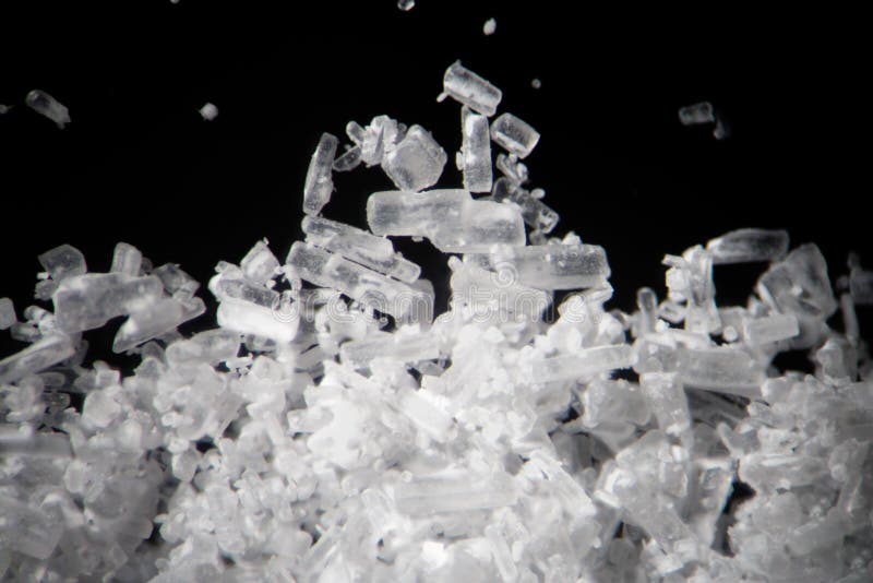 Creatine crystals by microscope looks like methamphetamine. Athletic dietary supplement in details supermacro close-up