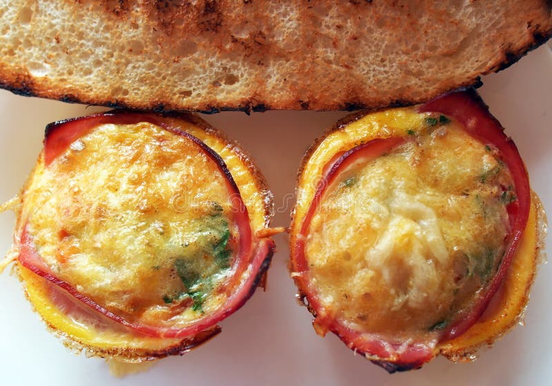 Creative breakfast â€“ egg muffins with bacon, coffee, white bread, butter