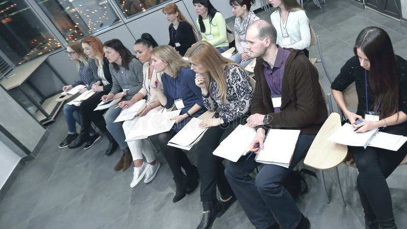 Creative business team discussing a new collection of clothes. royalty free stock photography Creative business team discussing a new collection of clothes. royalty free stock photography