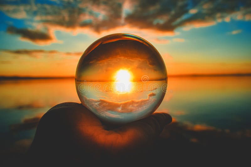 Creative Crystal Lens Ball Photography of the Sunset with Clouds