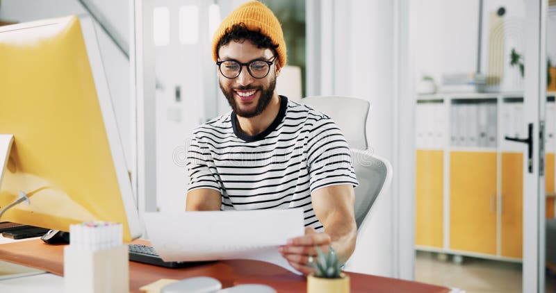 Creative designer, paperwork or happy man with computer in startup for artistic project, media or video editing. Document, script and research for content creation, post production and filmmaking. Computer editing stock images, royalty-free photos and pictures