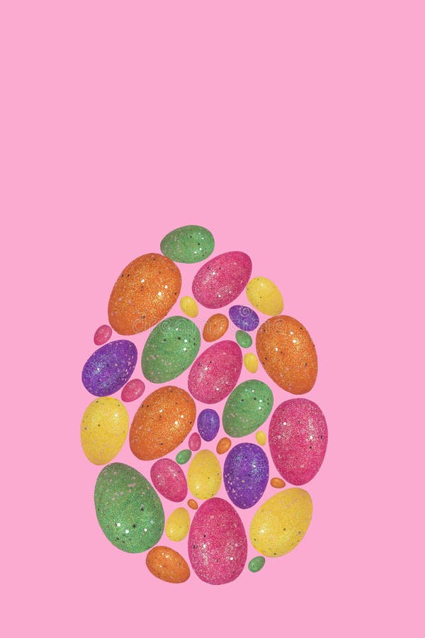 Creative Easter egg made with colorful eggs on bright pink background stock images