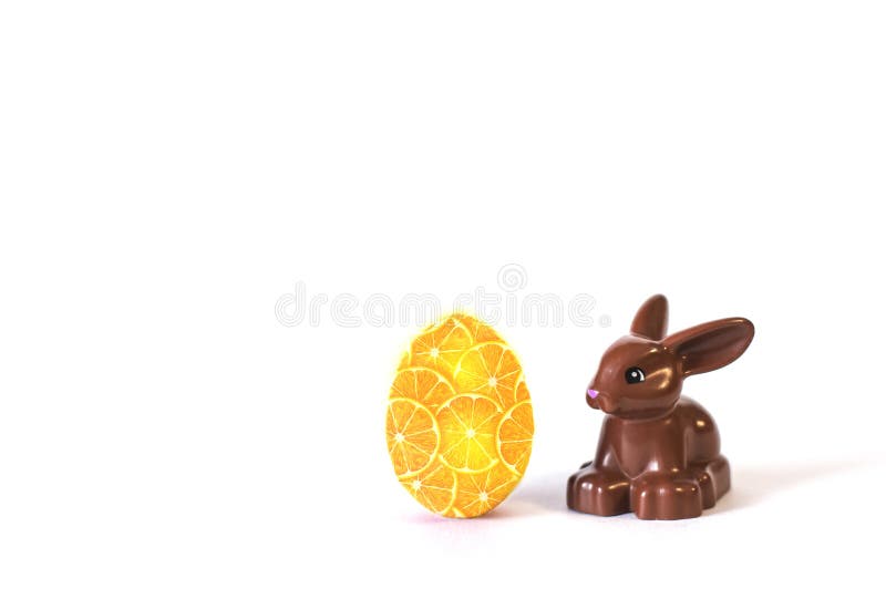 Creative Easter egg with a rabbit figurine. stock image