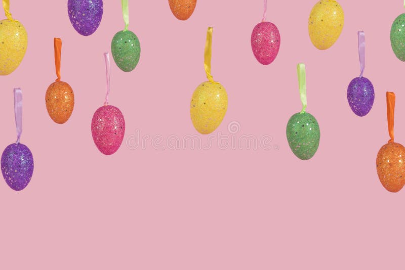 Creative Easter layout made of flying colorful eggs on light pink background stock illustration