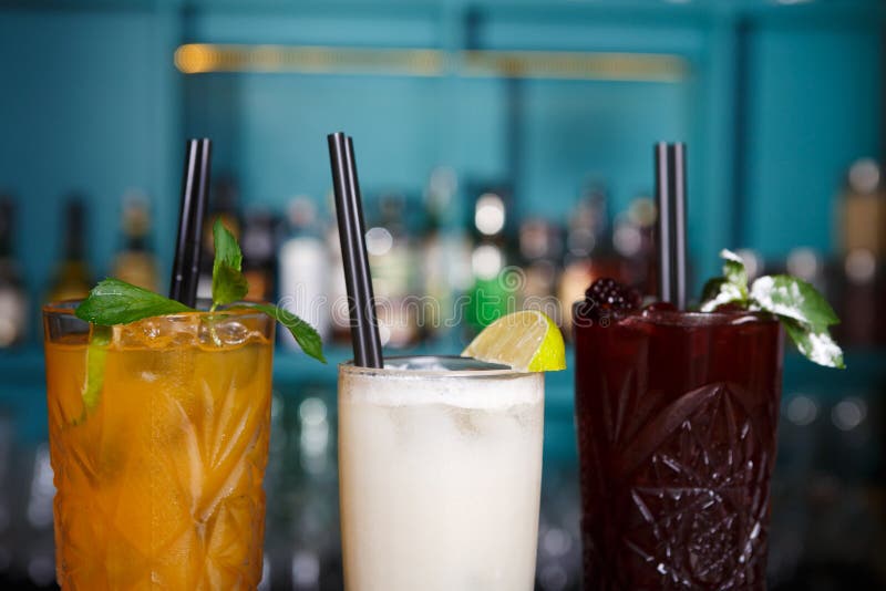 Creative exotic non-alcoholic cocktails in night club bar stock image Creative exotic non-alcoholic cocktails in night club bar stock image