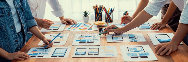 Creative front-end developer brainstorming UI design. Scrutinize royalty free stock photo