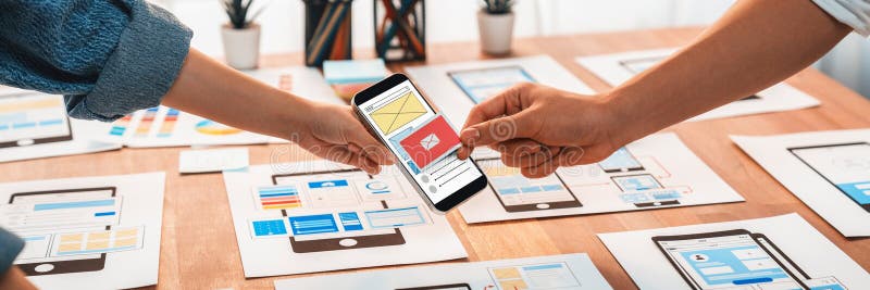 Creative front-end developer brainstorming UI design. Scrutinize royalty free stock photo