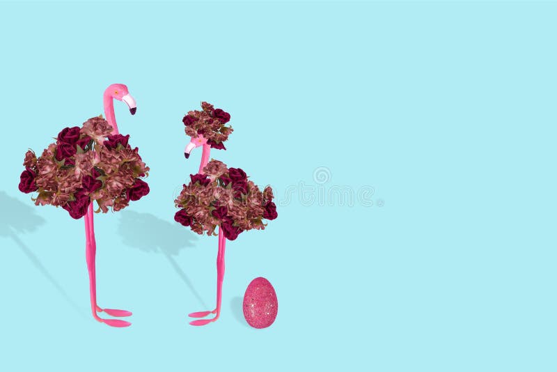 Creative fun idea with stylized couple of flamingo and Easter pink egg on a pastel blue background royalty free illustration