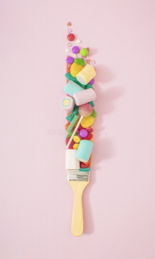 Creative Junk Food Concept of Paint Brush that Leaves Tasty Candy instead  of Paint. Pastel Pink Background Stock Photo - Image of design, jelly:  253578550