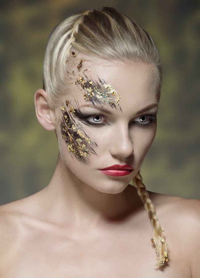 Creative make-up on female visage stock photos