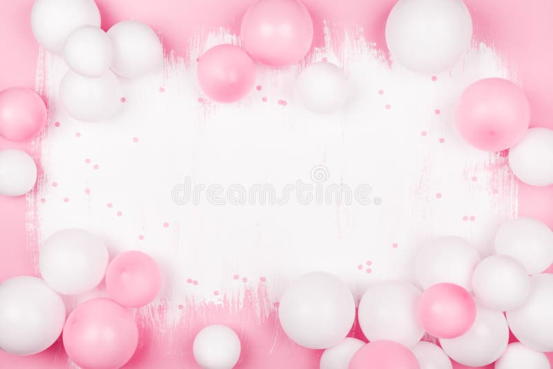 Creative painted background with white pink balloons and confetti. Top view and flat lay style. Birthday or party concept