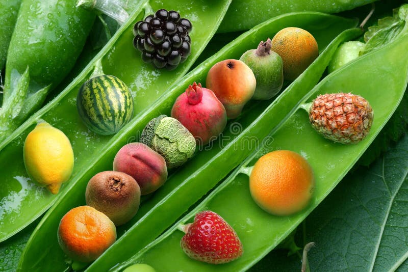 Creative pea with different fruits instead grains of pea. royalty free stock photography Creative pea with different fruits instead grains of pea. royalty free stock photography