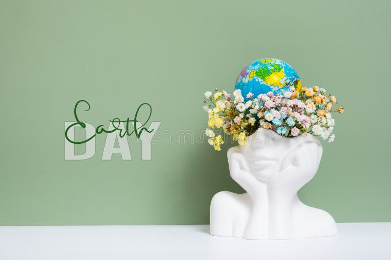 Creative Plaster Vase Headshape with Flowers and World Globe. Save the