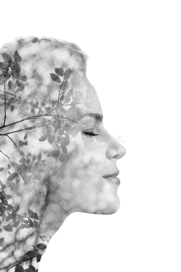 Creative portrait of beautiful young woman made from double exposure effect using photo of nature, isolated on white background