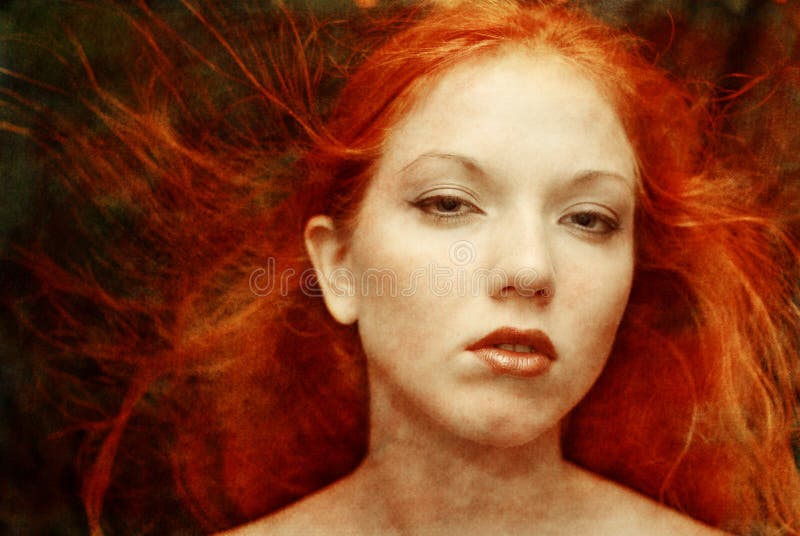 Creative portrait of a red-haired girl