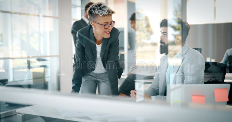 Creative business people working on business project in office stock photo Creative business people working on business project in office stock photo