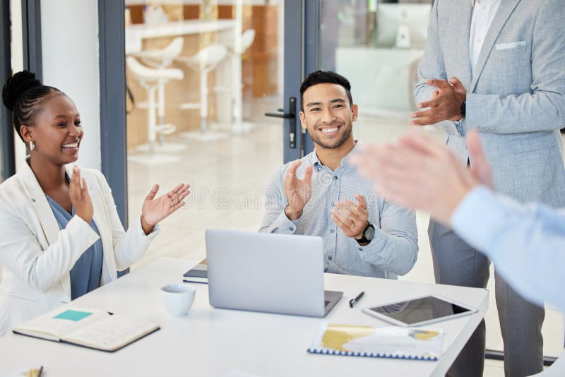 The creative talent behind winning designs. businesspeople clapping hands in a boardroom at work. Boardroom table clapping stock images, royalty-free photos and pictures