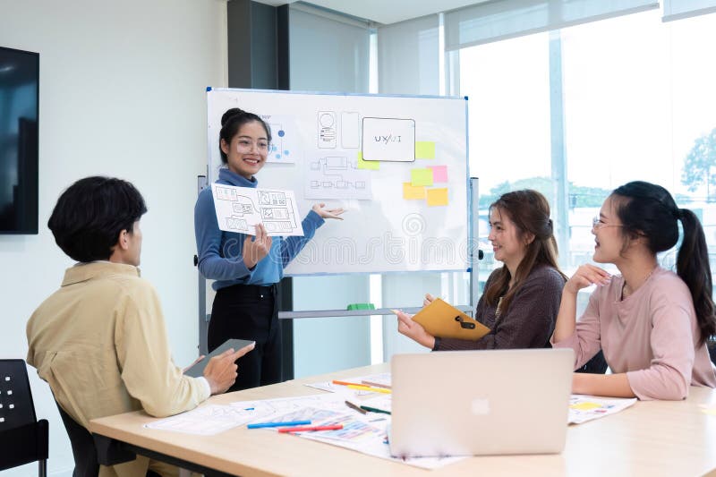 Creative team brainstorming meeting plans for group problem solving ideas, creative teamwork to develop mobile apps, ux royalty free stock image