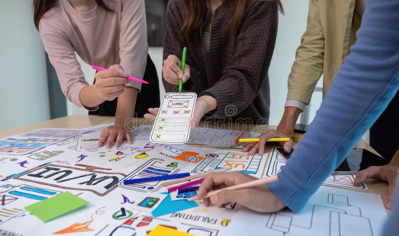 Creative team brainstorming meeting plans for group problem solving ideas, creative teamwork to develop mobile apps, ux royalty free stock photo