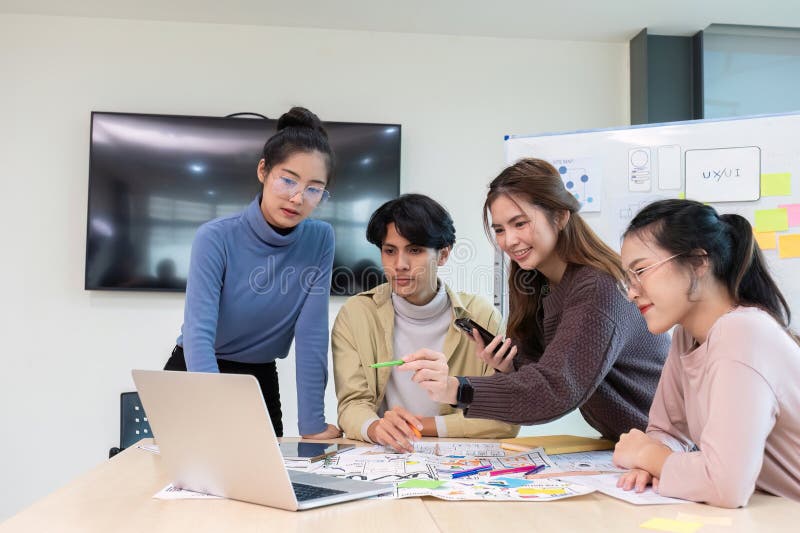 Creative team brainstorming meeting plans for group problem solving ideas, creative teamwork to develop mobile apps, ux royalty free stock image