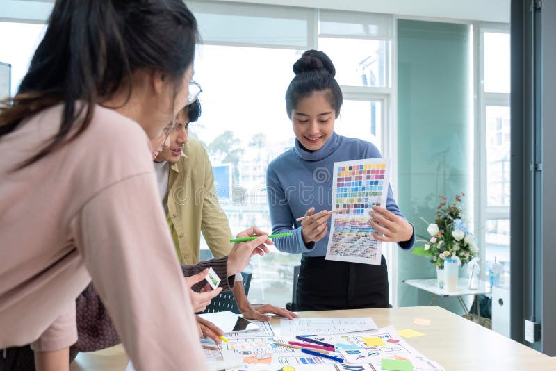 Creative team brainstorming meeting plans for group problem solving ideas, creative teamwork to develop mobile apps, ux royalty free stock image