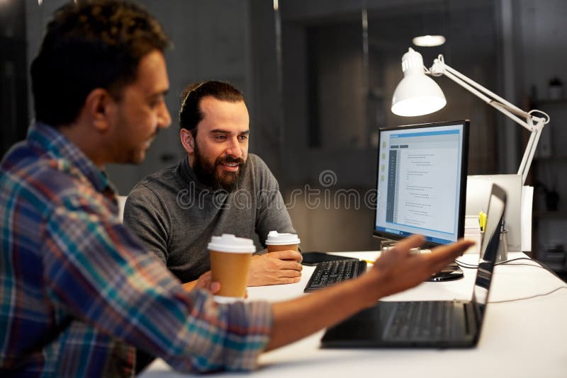 Creative Team Drinking Coffee at Night Office Stock Image Image of