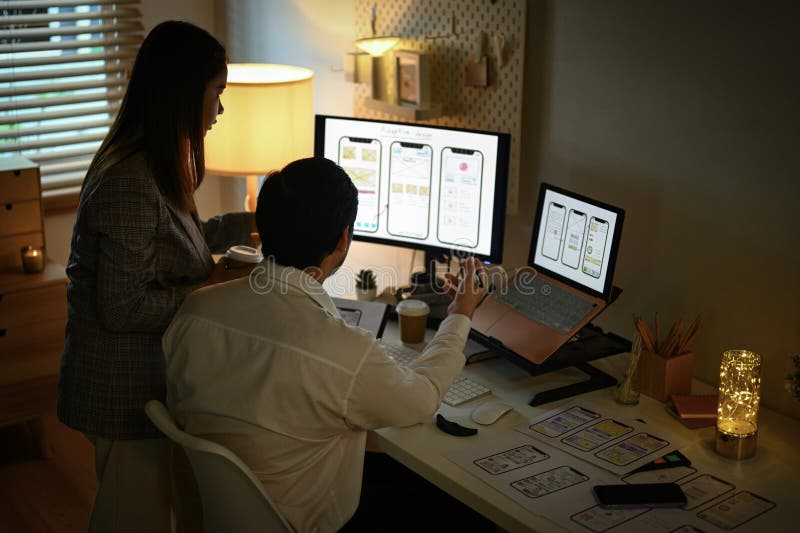 Creative team working on development project for mobile application at office. User experience concept royalty free stock photo