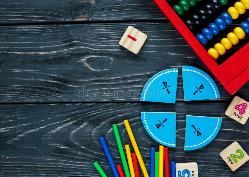 Creative Сolorful math fractions on dark background. Interesting funny math for kids. Education, back to school concept royalty free stock photography Creative Сolorful math fractions on dark background. Interesting funny math for kids. Education, back to school concept royalty free stock photography
