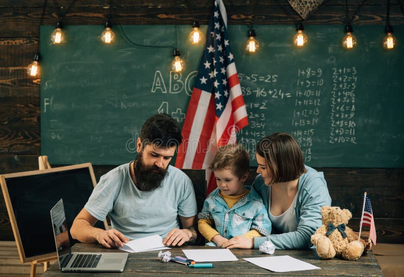 Creativity learning. Father teach art of paper folding to little son, creativity. Creativity and creative ideas royalty free stock photography Creativity learning. Father teach art of paper folding to little son, creativity. Creativity and creative ideas royalty free stock photography