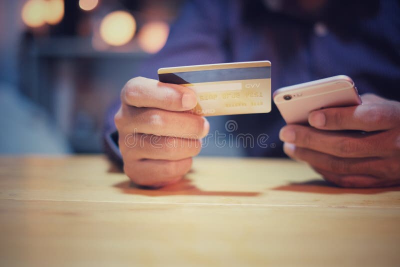 credit-card-for-online-shopping-payment-with-smartphone-stock-image