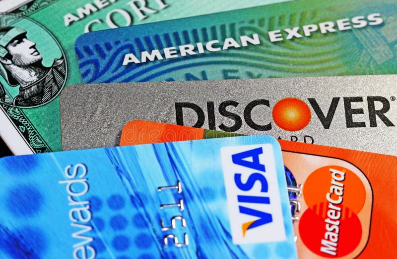 Close up shot of various credit card logos including American Express, Discover, Visa and Mastercard. The first credit card was used in the 1920s, in the United States, specifically to sell fuel to a growing number of automobile owners. In 1938 several companies started to accept each other's cards. Western Union had begun issuing charge cards to its frequent customers in 1921. Close up shot of various credit card logos including American Express, Discover, Visa and Mastercard. The first credit card was used in the 1920s, in the United States, specifically to sell fuel to a growing number of automobile owners. In 1938 several companies started to accept each other's cards. Western Union had begun issuing charge cards to its frequent customers in 1921.