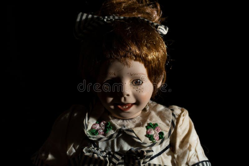 362 Creepy Doll Head Black Background Photos Free & RoyaltyFree
