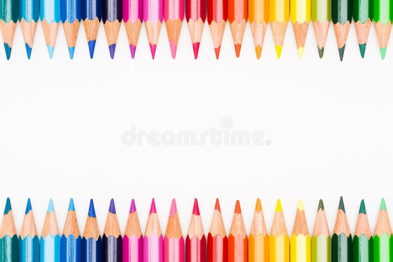 Creioane colorate aliniate pe rând royalty free stock image