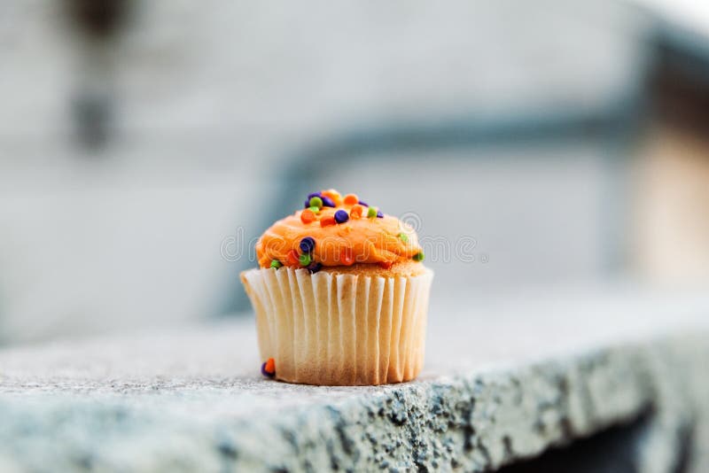 Crema festiva de MIni Cupcake With Orange Vanilla imagen de archivo Crema festiva de MIni Cupcake With Orange Vanilla imagen de archivo