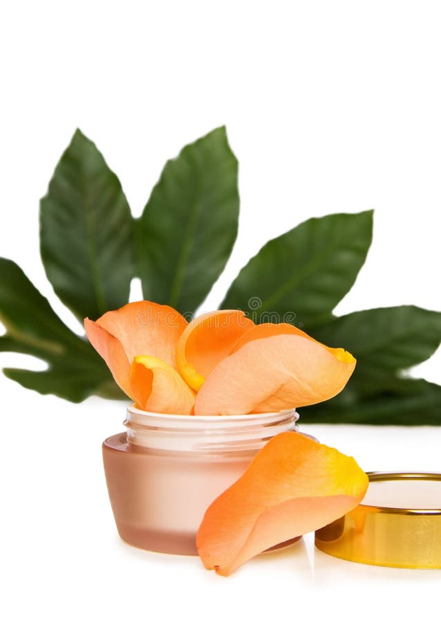 Crema hidratante de lujo de la cara con las rosas imágenes de archivo libres de regalías Crema hidratante de lujo de la cara con las rosas imágenes de archivo libres de regalías