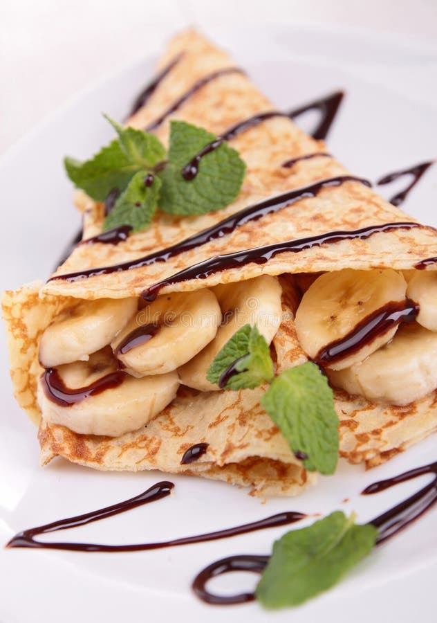 Close up on banana crepe with chocolate. Close up on banana crepe with chocolate