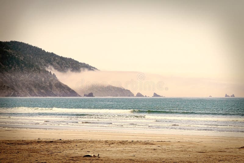 Crescent City Beach, California. Beach, rocks, mountains, Pacific Ocean.